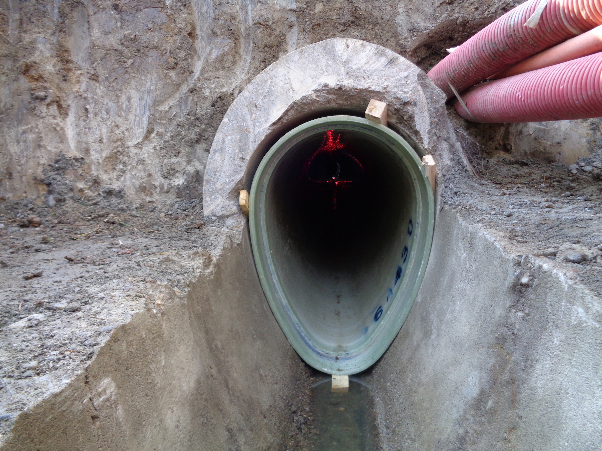 Budaplast GRP non-circular pipe installed in trench, laser alignment